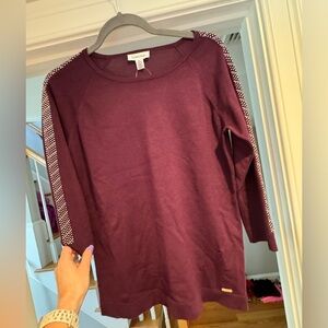 Maroon sweater with gem detail on sleeve
